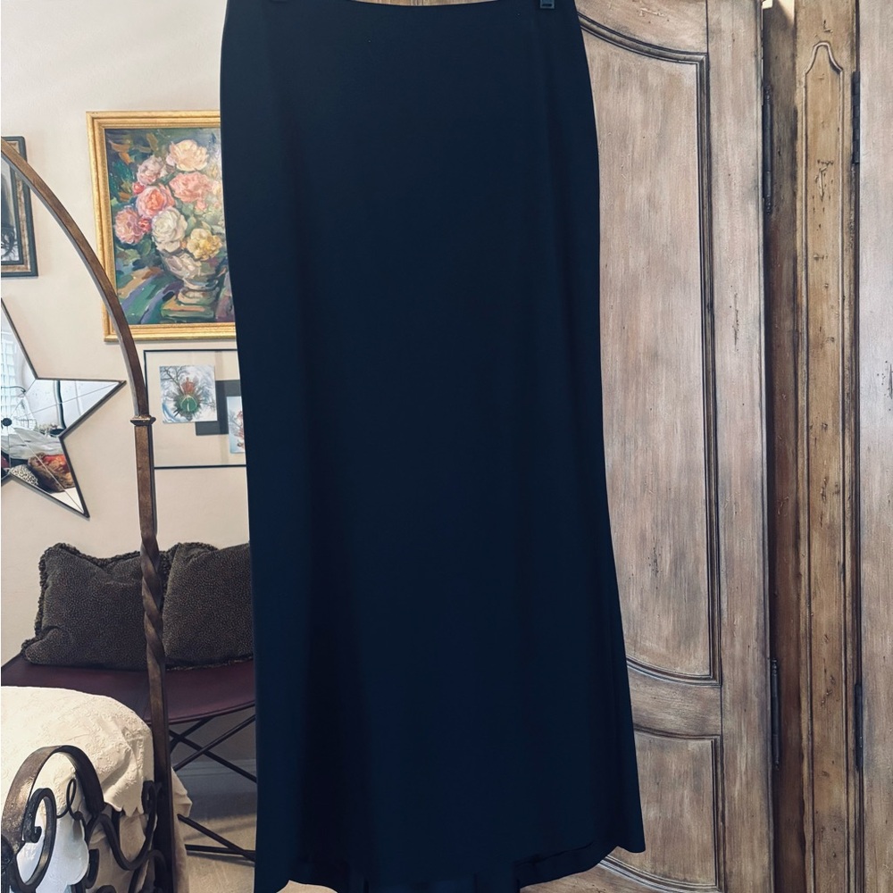Elegant Emporio Armani straight maxi skirt with pleated back train.